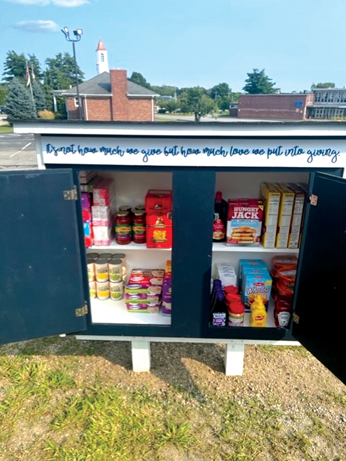 THE HOPE CHEST: Johnston’s Hope Chest stands along Memorial Avenue next to Marian J. Mohr Memorial Library, erected by Plates With Purpose, a local nonprofit. Anyone in need of food is encouraged to stop by and help themselves. Those with extra food are encouraged to donate shelf-stable items.